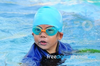 Boy With Swimming Accessories Stock Photo