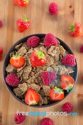 Bran Flakes With Fresh Raspberries And Strawberries Stock Photo