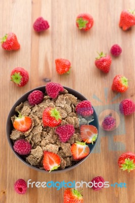 Bran Flakes With Fresh Raspberries And Strawberries Stock Photo