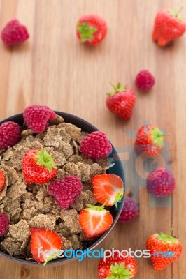 Bran Flakes With Fresh Raspberries And Strawberries Stock Photo