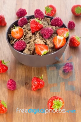 Bran Flakes With Fresh Raspberries And Strawberries Stock Photo