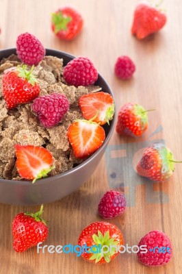 Bran Flakes With Fresh Raspberries And Strawberries Stock Photo