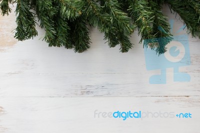 Branch Of Fir Tree,christmas Leaf On Wooden Floor Background  Stock Photo