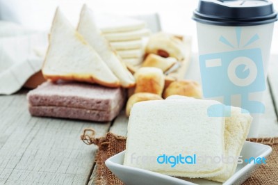 Bread And Coffee Cup On Table Stock Photo