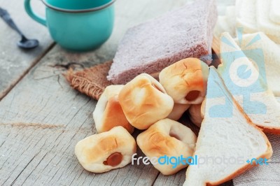 Bread And Coffee Cup On Wooden Stock Photo