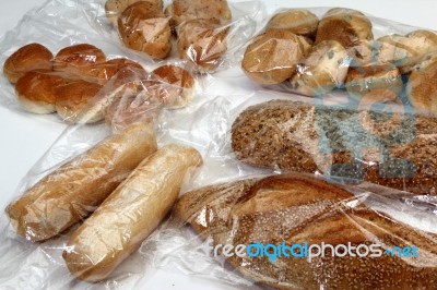 Bread And Cookies In Cellophane Bags Stock Photo