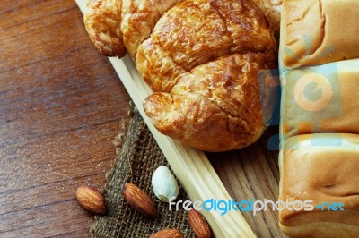 Bread On Wooden Background Stock Photo