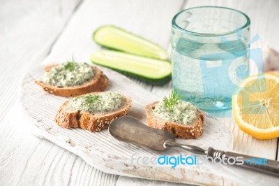 Bread With Tzatziki On The White Wooden Table Horizontal Stock Photo