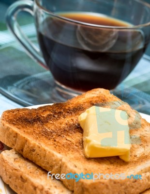 Breakfast Butter Toast Indicates Toasted Bread And Black Stock Photo