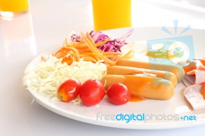 Breakfast Meal And Salad On Morning Table Stock Photo