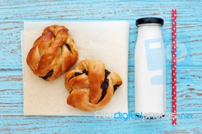 Breakfast With Bread Roll And Milk Stock Photo