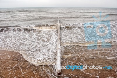 Breakwater Covered By Ice Stock Photo