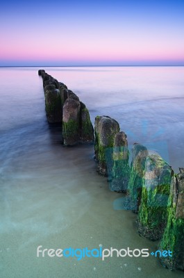 Breakwater Sunset Stock Photo