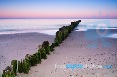 Breakwater Sunset Stock Photo