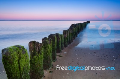 Breakwater Sunset Stock Photo