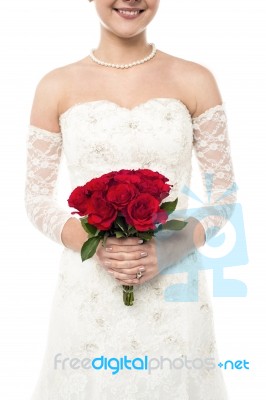 Bride With A Rose Bouquet Stock Photo