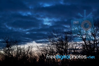 Bright Cloudy Sky At Sunset Stock Photo