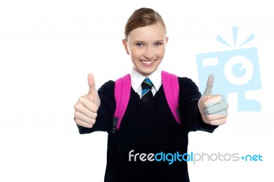 Bright Student Showing Thumbs Up Sign Stock Photo