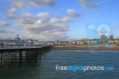 Brighton Beach And Pier Stock Photo