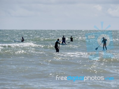 Brighton, East Sussex/uk - May 24 : People Paddle Boarding At Br… Stock Photo