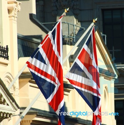 British Union Jacks Outside A Building In England Stock Photo