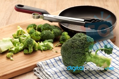 Broccoli On Kitchen Table Stock Photo