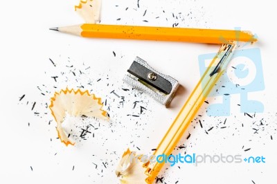 Broken Pencil With Metal Sharpener And Shavings Stock Photo