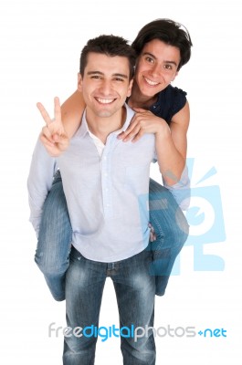 Brother And Sister Showing Victory Sign Stock Photo