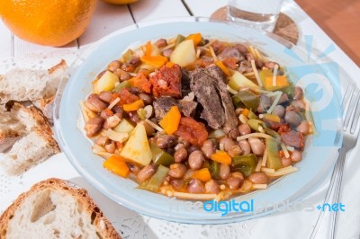 Brown Beans With Meat And Carrot Stock Photo