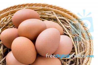 Brown Chicken Eggs In Basket Stock Photo