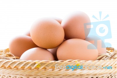 Brown Chicken Eggs In Basket Stock Photo