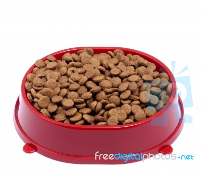 Brown Dry Cat Or Dog Food In Red Bowl Isolated On White Backgrou… Stock Photo