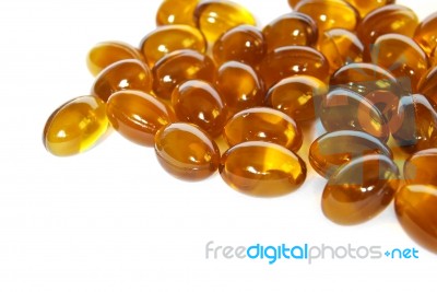 Brown Fish Oil Gel Capsule Pills Closeup Stock Photo