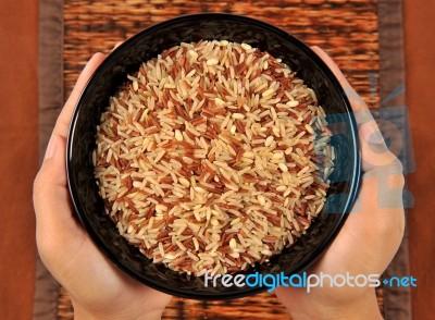 Brown Rice On Bowl Stock Photo