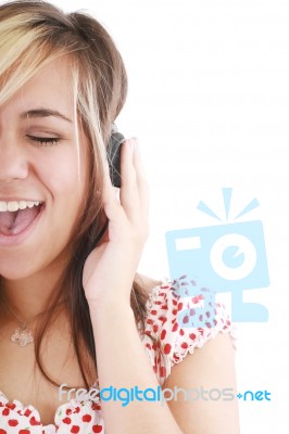 Brunette Is Listening To Music Stock Photo