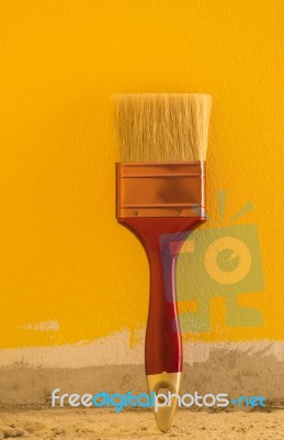 Brush Paint Yellow Color On Cement Wall Backgroundt Stock Photo