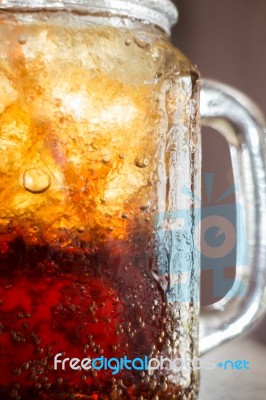 Bubble And Foam On The Glass Wall Of Cola Stock Photo