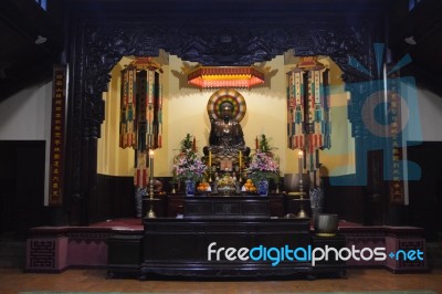 Buddha On The Altar Table In The Room Stock Photo