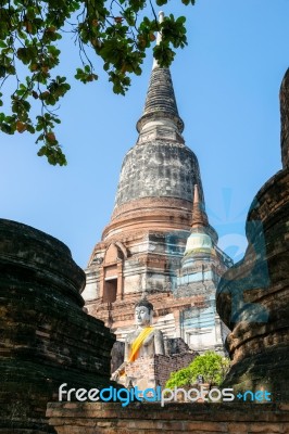 Buddha Statue And Ancient Pagoda Stock Photo