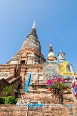 Buddha Statue And Ancient Pagoda Stock Photo