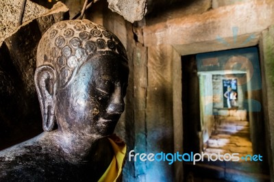 Buddha Statue In A Hallway Stock Photo