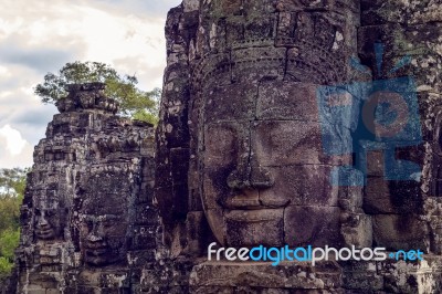 Buddhist Faces Bayon Temple, Angkor Wat In Cambodia Stock Photo