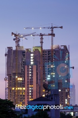 Building Under Construction, Twilight Time Stock Photo