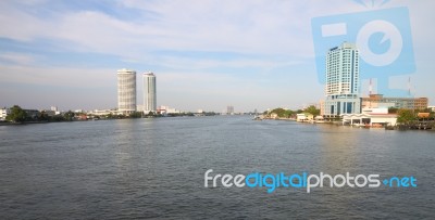 Building Water Front Of Wide River Stock Photo