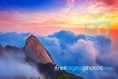 Bukhansan Mountains Is Covered By Morning Fog And Sunrise In Bukhansan National Park, Seoul In South Korea Stock Photo