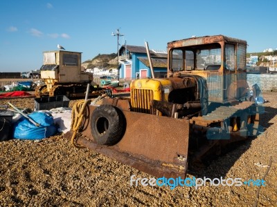 Bulldozers On Hastings Beach Stock Photo