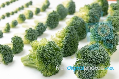 Bunch Of Broccoli Vegetables Aligned In A Perfect Way Stock Photo