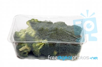 Bunch Of Broccoli Vegetables Wrapped In Plastic Stock Photo