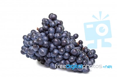 Bunch Of Fresh Red Grapes Isolated On White Stock Photo