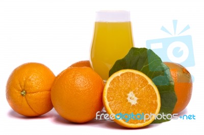 Bunch Of Oranges With Juice Stock Photo